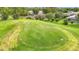 Scenic green golf course with lush surroundings and picturesque residential homes at 30 Lake Diamond Ave, Ocala, FL 34472