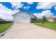 Charming one-story home with a two-car garage, beautifully landscaped front yard, and a well-maintained driveway at 3647 Minute Maid Ramp Rd 1 Rd, Davenport, FL 33837