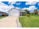 Charming single-Gathering home with a well-manicured lawn and attached two-car garage at 3647 Minute Maid Ramp Rd 1 Rd, Davenport, FL 33837