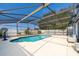 Large screened-in pool area with plenty of seating on the patio at 3647 Minute Maid Ramp Rd 1 Rd, Davenport, FL 33837