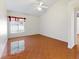 Bright bedroom with tile flooring and a ceiling fan at 3811 Gator Bay Ln, St Cloud, FL 34772