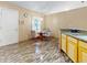 Cozy dining area next to kitchen features natural light and tile flooring at 3811 Gator Bay Ln, St Cloud, FL 34772