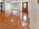 Inviting foyer with decorative tiled floors, columns, and a unique stained glass front door at 3811 Gator Bay Ln, St Cloud, FL 34772