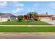 Landscaped single Gathering home with lush green lawn and mature trees in a residential neighborhood at 3811 Gator Bay Ln, St Cloud, FL 34772