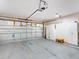 Spacious garage with insulated door and ample storage at 3811 Gator Bay Ln, St Cloud, FL 34772