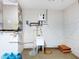 Clean utility room featuring sink and eco-friendly water heater at 3811 Gator Bay Ln, St Cloud, FL 34772