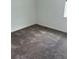 Neutral carpeted bedroom with baseboard, window with blinds, and white walls at 4053 Redbridge Loop, Davenport, FL 33837