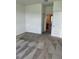 Bright bedroom featuring neutral carpet, ensuite bathroom and closet at 4053 Redbridge Loop, Davenport, FL 33837