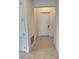 Hallway with tiled flooring and neutral paint at 4053 Redbridge Loop, Davenport, FL 33837