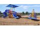 Community playground featuring slides, climbing structures and shade at 4053 Redbridge Loop, Davenport, FL 33837