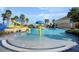 pool area with a play structure and wading area at 4053 Redbridge Loop, Davenport, FL 33837