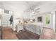 Neutral bedroom featuring natural light, tile floors, and a rug at 435 Pennsylvania Ave, St Cloud, FL 34769