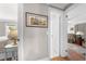 Hallway that connects to rooms that are beautifully furnished, adding unique character at 435 Pennsylvania Ave, St Cloud, FL 34769