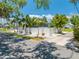 Charming house with a screened pool in the backyard, surrounded by tropical foliage for a private retreat at 435 Pennsylvania Ave, St Cloud, FL 34769