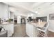 Spacious open kitchen with granite countertops, pendant lighting, and a large center island with seating at 435 Pennsylvania Ave, St Cloud, FL 34769