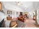 Cozy living room with fireplace, comfortable seating, and decorative furnishings at 435 Pennsylvania Ave, St Cloud, FL 34769