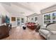 Open living room with neutral colors and access to the pool at 435 Pennsylvania Ave, St Cloud, FL 34769