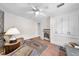 Cozy sitting room with plenty of space, animal print chairs, and tile floors at 435 Pennsylvania Ave, St Cloud, FL 34769