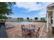 Community pool area with lounge chairs, tables, and a fun splash fountain at 454 Hamlet Loop, Davenport, FL 33837