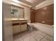 Bathroom with tile flooring, vanity sink, a toilet and a bathtub with shower at 4905 Sanoma Vlg # Ge, Orlando, FL 32808