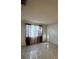 Bedroom with tile flooring and a window offering natural light and providing a view at 4905 Sanoma Vlg # Ge, Orlando, FL 32808