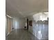 Bright and airy living room features neutral paint, tile floors and natural lighting at 4905 Sanoma Vlg # Ge, Orlando, FL 32808