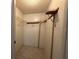 A walk-in closet with installed shelving offering ample storage space at 4905 Sanoma Vlg # Ge, Orlando, FL 32808