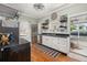 Quaint kitchen featuring butcher block countertops, a black appliances, and vintage fixtures at 525 W Blue Springs Ave, Orange City, FL 32763