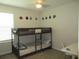 Bedroom with a bunk bed, cartoon stickers and window at 537 S Andrea Cir, Haines City, FL 33844