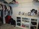 Walk-in closet with wire shelving and a storage cabinet at 537 S Andrea Cir, Haines City, FL 33844