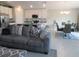 Well-lit open space with kitchen, dining, and living room at 537 S Andrea Cir, Haines City, FL 33844