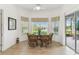 Charming breakfast nook offers natural light and a cozy dining space with views of the outdoors at 561 Tapatio Ln, Kissimmee, FL 34759