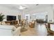 Spacious living room featuring stylish furnishings and an open layout for entertaining and relaxing at 561 Tapatio Ln, Kissimmee, FL 34759