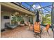 Entertain in style on this brick patio, complete with a ceiling fan, dining set, and comfortable seating at 561 Tapatio Ln, Kissimmee, FL 34759