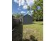 The backyard has a storage shed and a wood fence on the side at 6489 Creation St, St Cloud, FL 34771