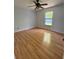 Bright bedroom with beautiful wood flooring and lots of natural light at 6489 Creation St, St Cloud, FL 34771