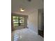 Inviting living room featuring large windows offering lots of natural light and elegant marble floors at 6489 Creation St, St Cloud, FL 34771