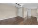 Bedroom featuring laminate flooring, a closet and neutral paint at 710 Carlton Ave, Lake Wales, FL 33853
