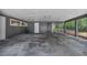 Large carport featuring an open side and entry door at 710 Carlton Ave, Lake Wales, FL 33853