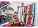 Walk-in closet with wire shelving and hanging rods at 8835 Abbey Leaf Ln, Orlando, FL 32827