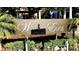 Waters Edge at Lake Nona sign surrounded by green foliage at 8835 Abbey Leaf Ln, Orlando, FL 32827