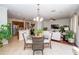 Spacious dining area open to the living room and kitchen at 8835 Abbey Leaf Ln, Orlando, FL 32827