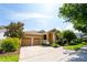 Charming single-Gathering home featuring a two-car garage, manicured landscaping, and a welcoming entrance at 8835 Abbey Leaf Ln, Orlando, FL 32827