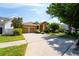 Charming single-story home featuring a two-car garage and well-maintained landscaping at 8835 Abbey Leaf Ln, Orlando, FL 32827