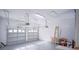 Spacious two car garage with storage racks and ample room for parking at 8835 Abbey Leaf Ln, Orlando, FL 32827