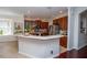 Open kitchen featuring a breakfast bar and ample counter space at 8835 Abbey Leaf Ln, Orlando, FL 32827