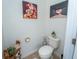 Toilet room with modern art and decor at 8835 Abbey Leaf Ln, Orlando, FL 32827