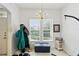 Versatile room with a chandelier, two windows, tile flooring, and a coat rack at 1231 Wright Cir # 1213, Celebration, FL 34747
