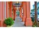 Boutique storefront with a covered walkway and colorful architecture at 1231 Wright Cir # 1213, Celebration, FL 34747