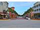 Colorful town center featuring shops, restaurants, and palm tree-lined streets at 1231 Wright Cir # 1213, Celebration, FL 34747